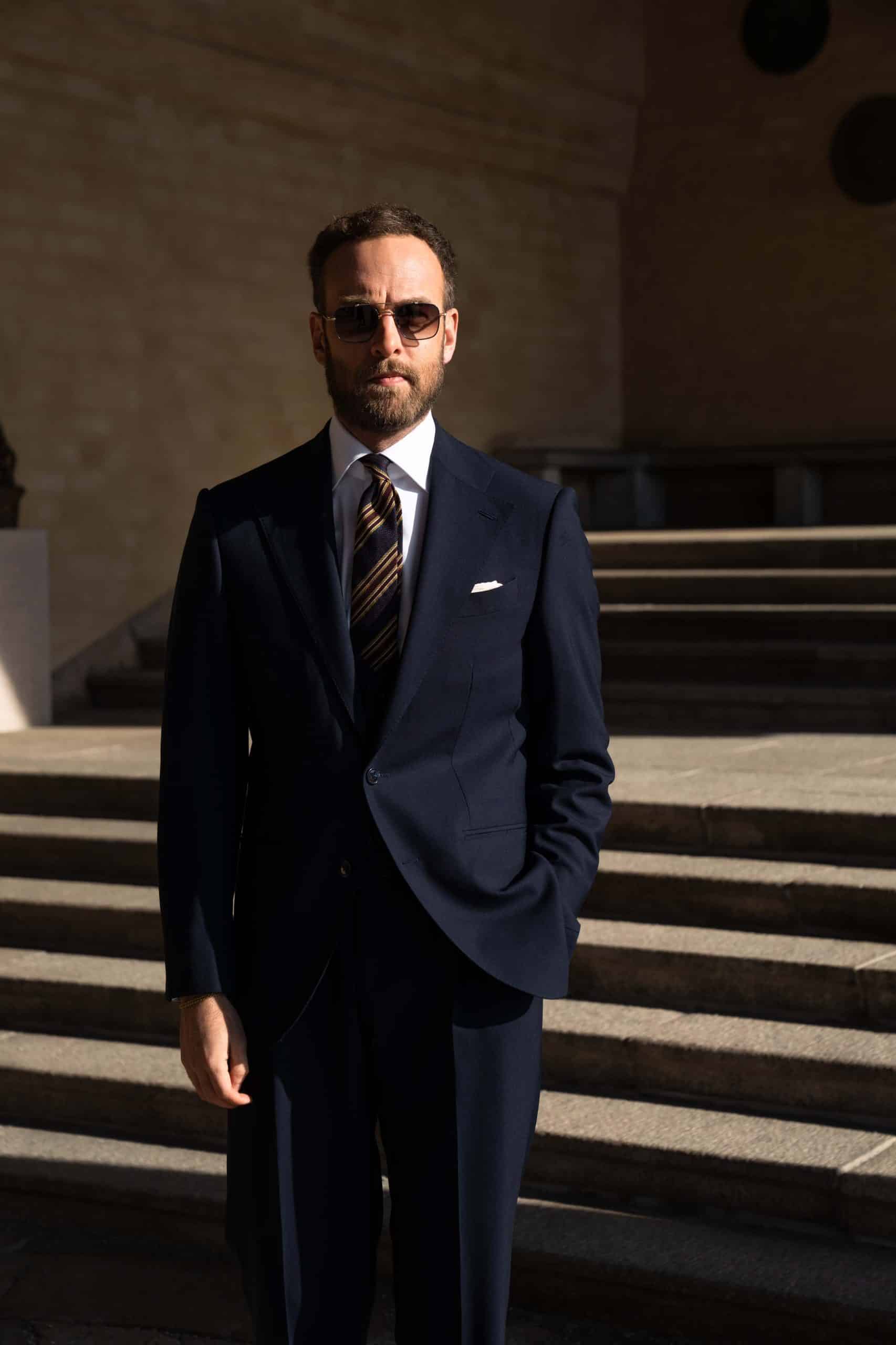 Andreas weinas wearing mond navy twistair suit scaled - - mond