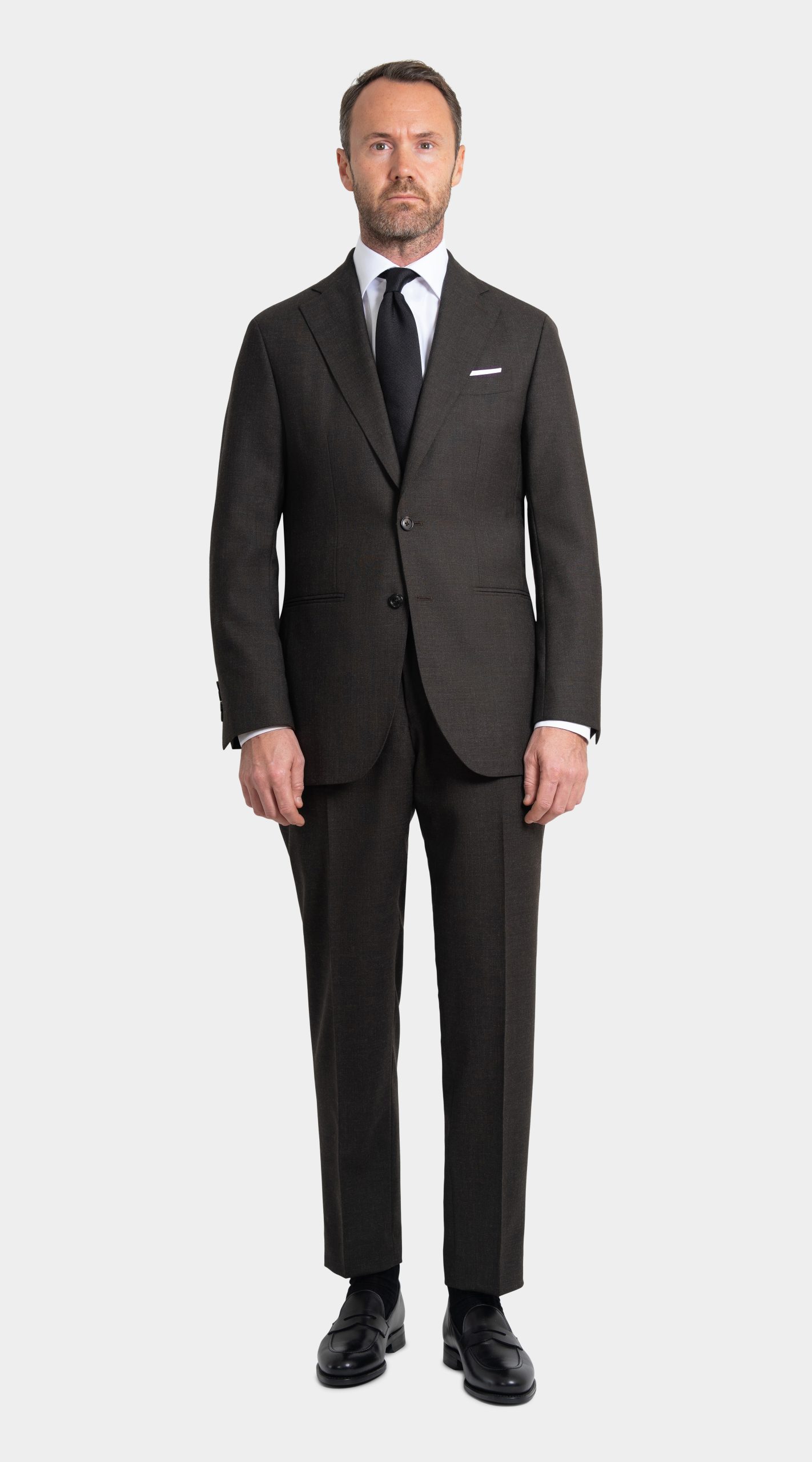 custom brown suit in twistair, with black shoes