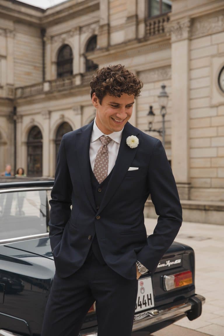 Three-piece suit with boutonniere