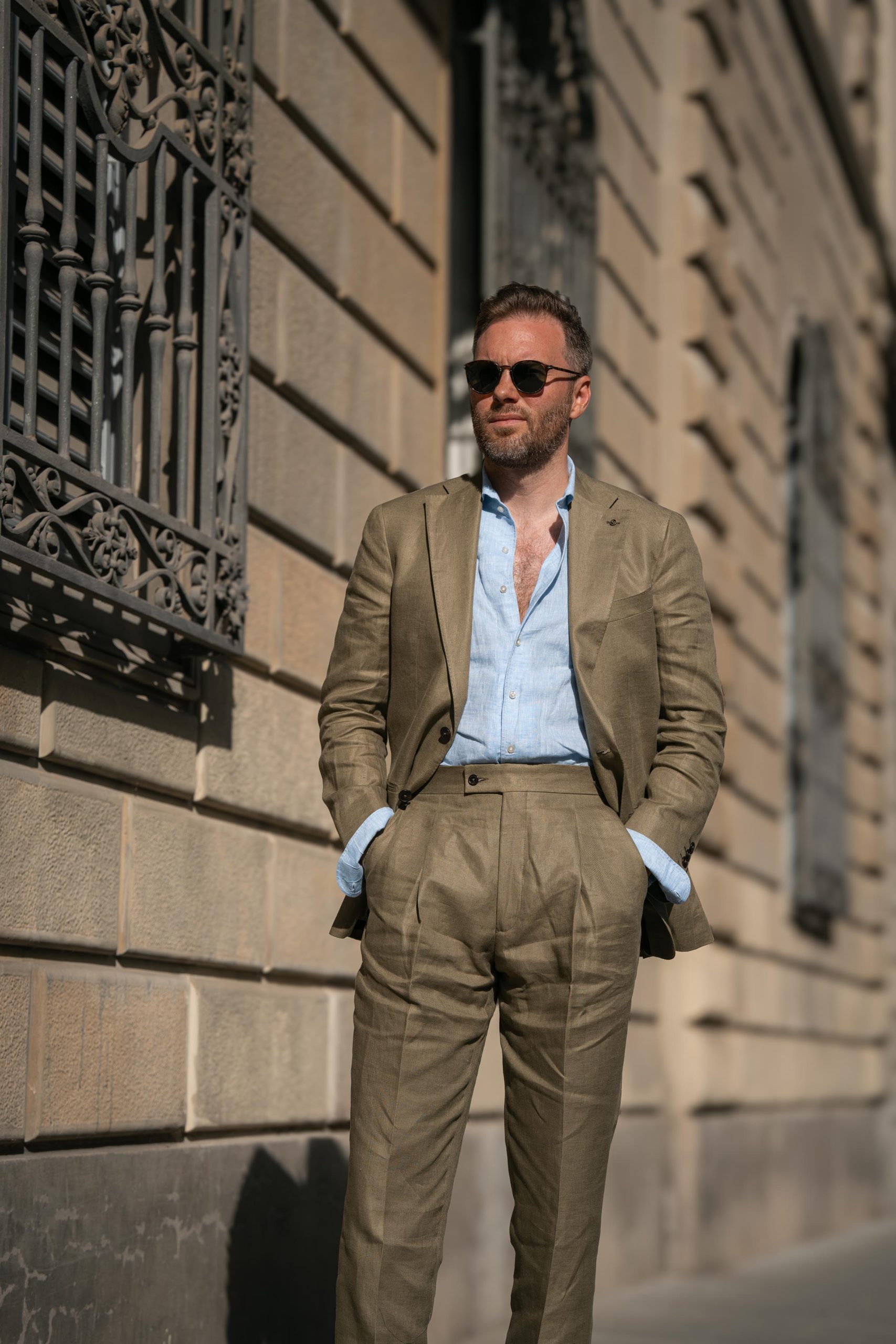 Mond co-founder Michael Jacobsen spotted at pitti uomo 106 wearing a khaki linen suit