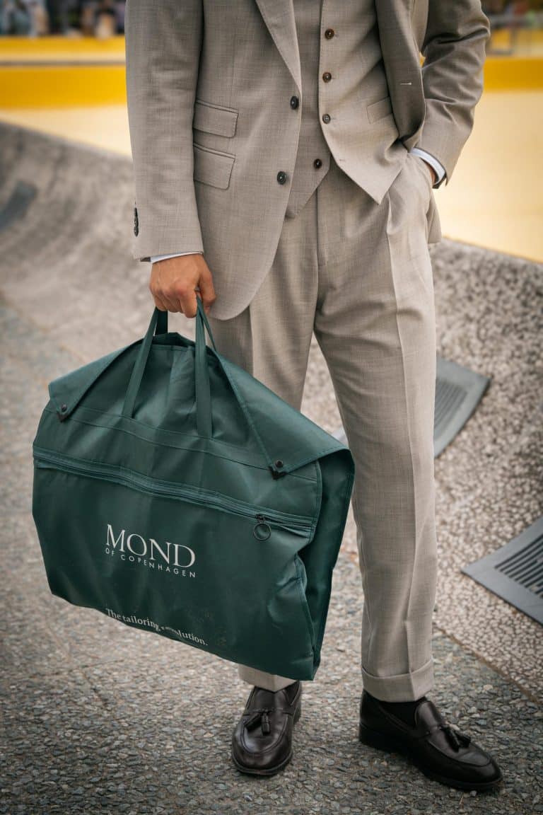 Okan dergentleman at pitti uomo wearing a grey mond suit