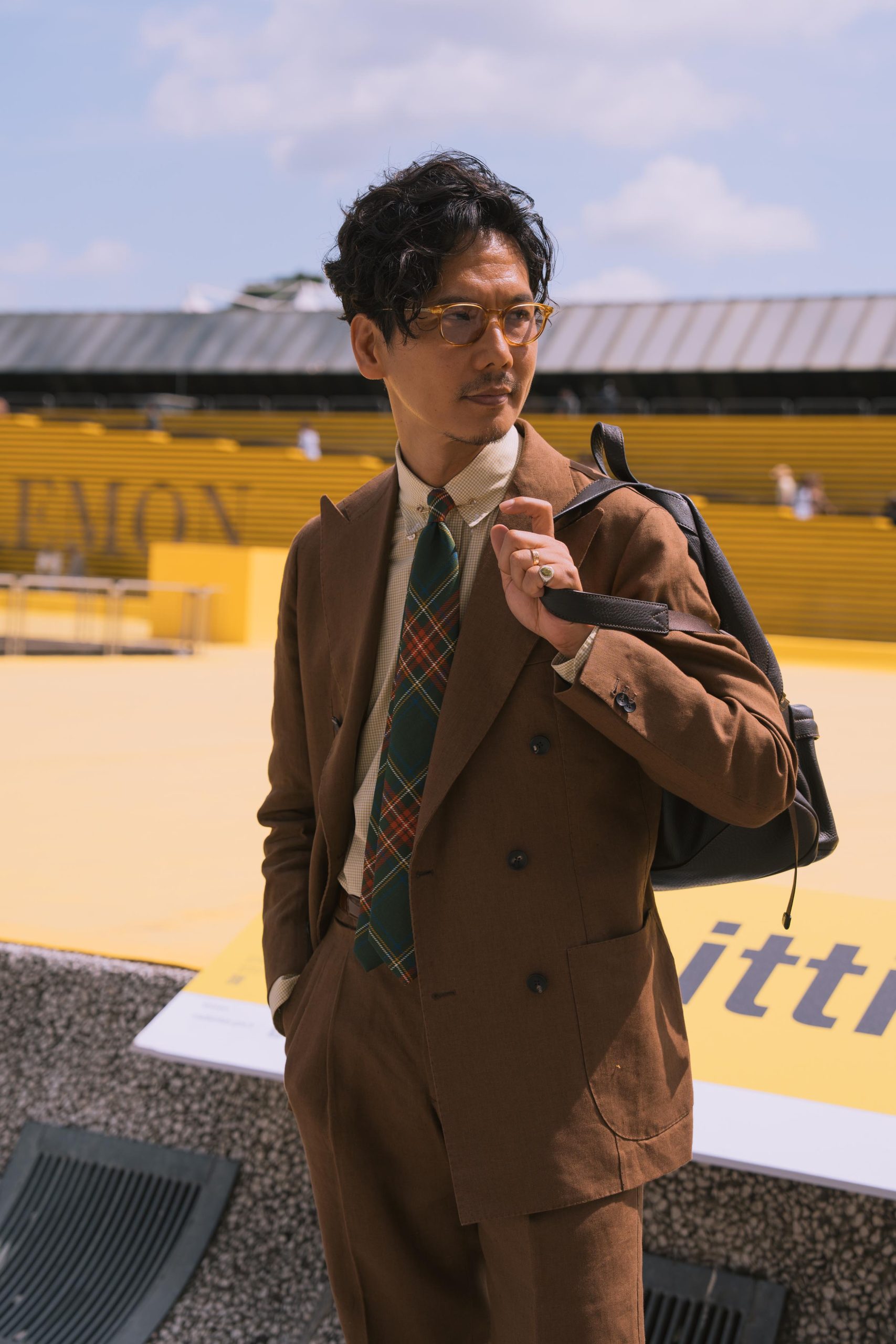 Shuhei Nishiguchi at Pitti Uomo wearing a brown suit. spotted by Mond