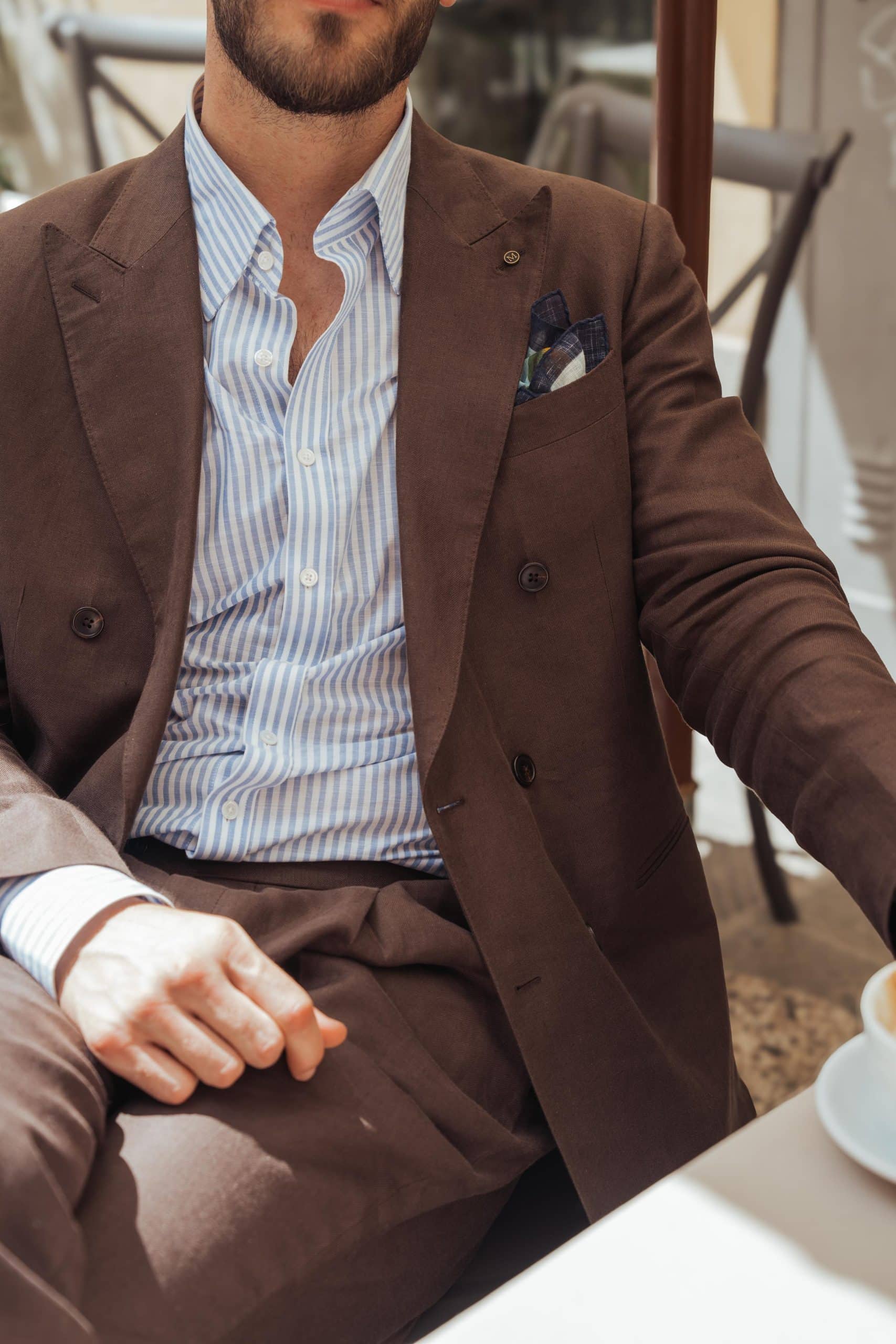 Burkhard diettrich at pitti uomo wearing a brown linen suit made by mond of copenhagen
