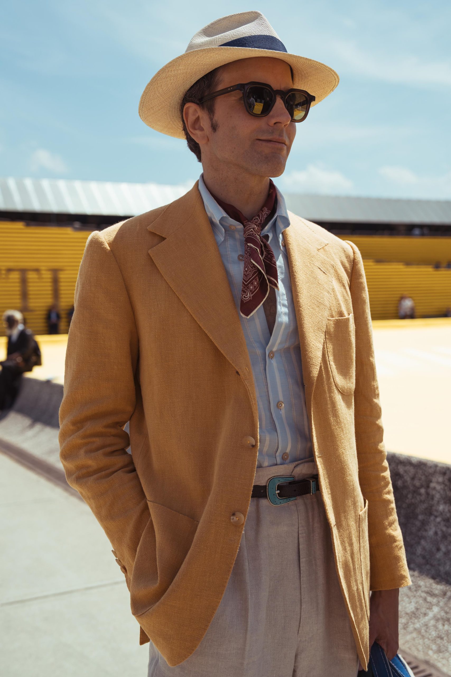 erik mannby at pitti umo 106 in a mustard yellow jacket