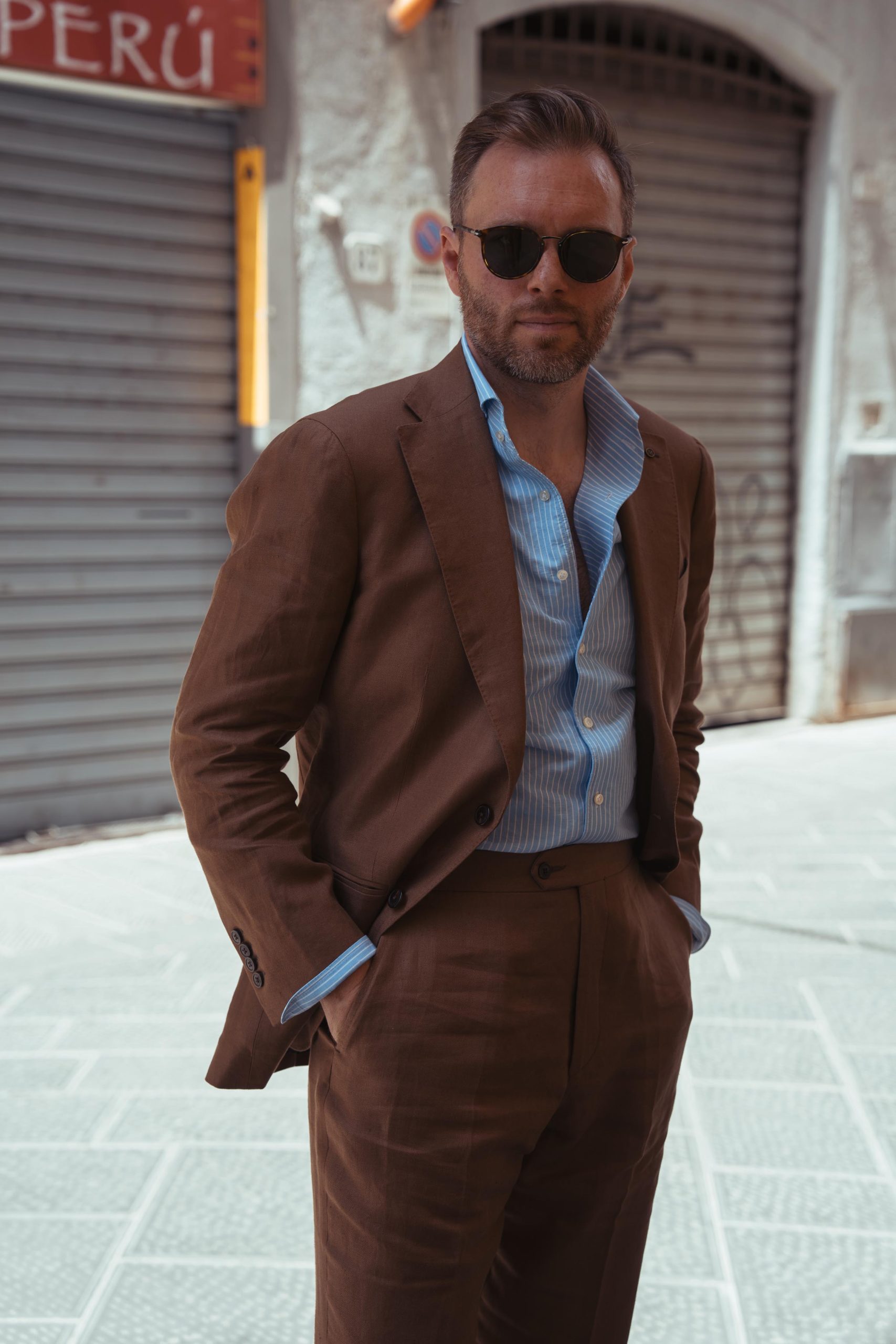 Mond co-founder Michael Jacobsen spotted at pitti uomo in brown linen suit by mond of copenhagen