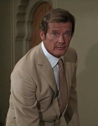 Roger Moore in a Tan suit