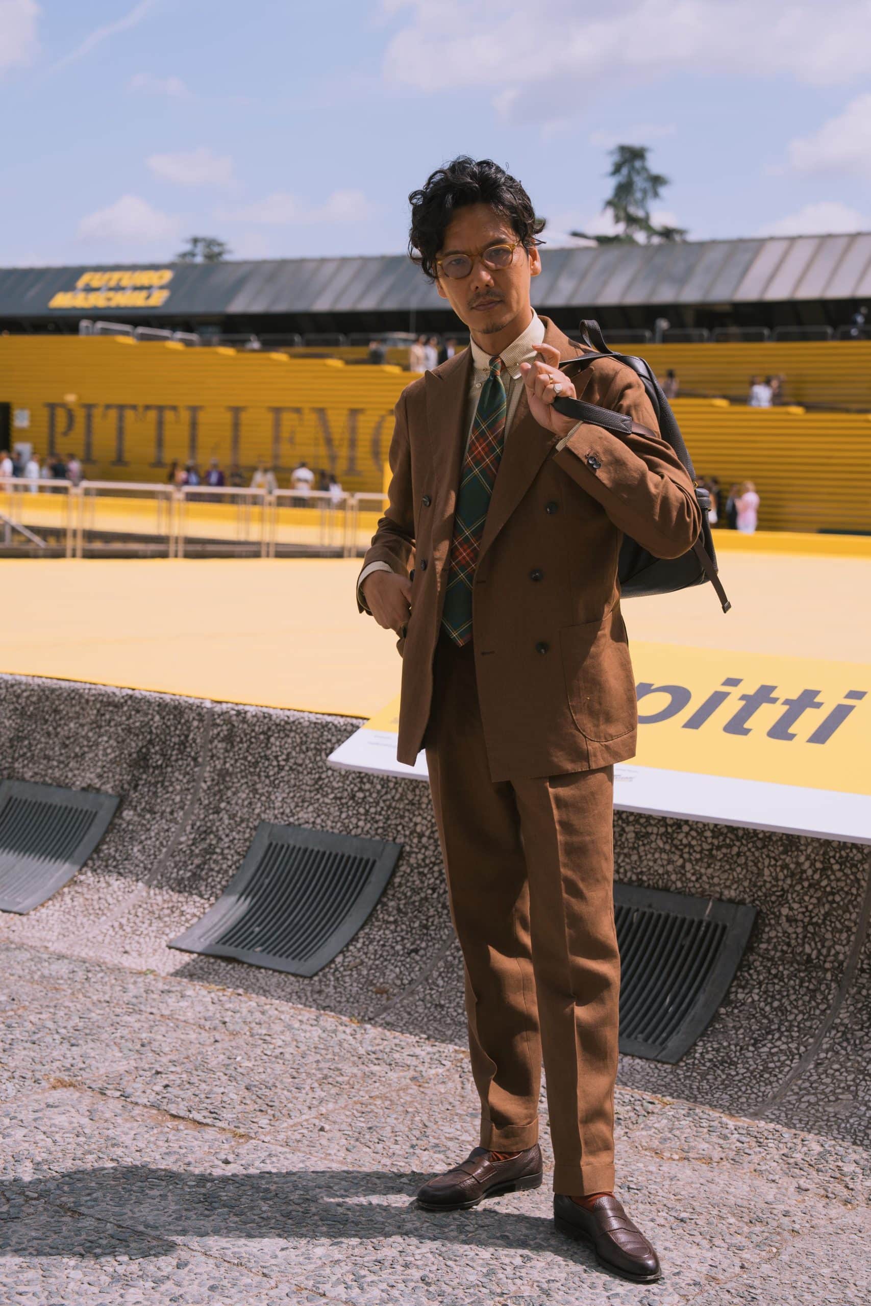 Shuhei nishiguchi at pitti uomo wearing a brown suit mond style journal