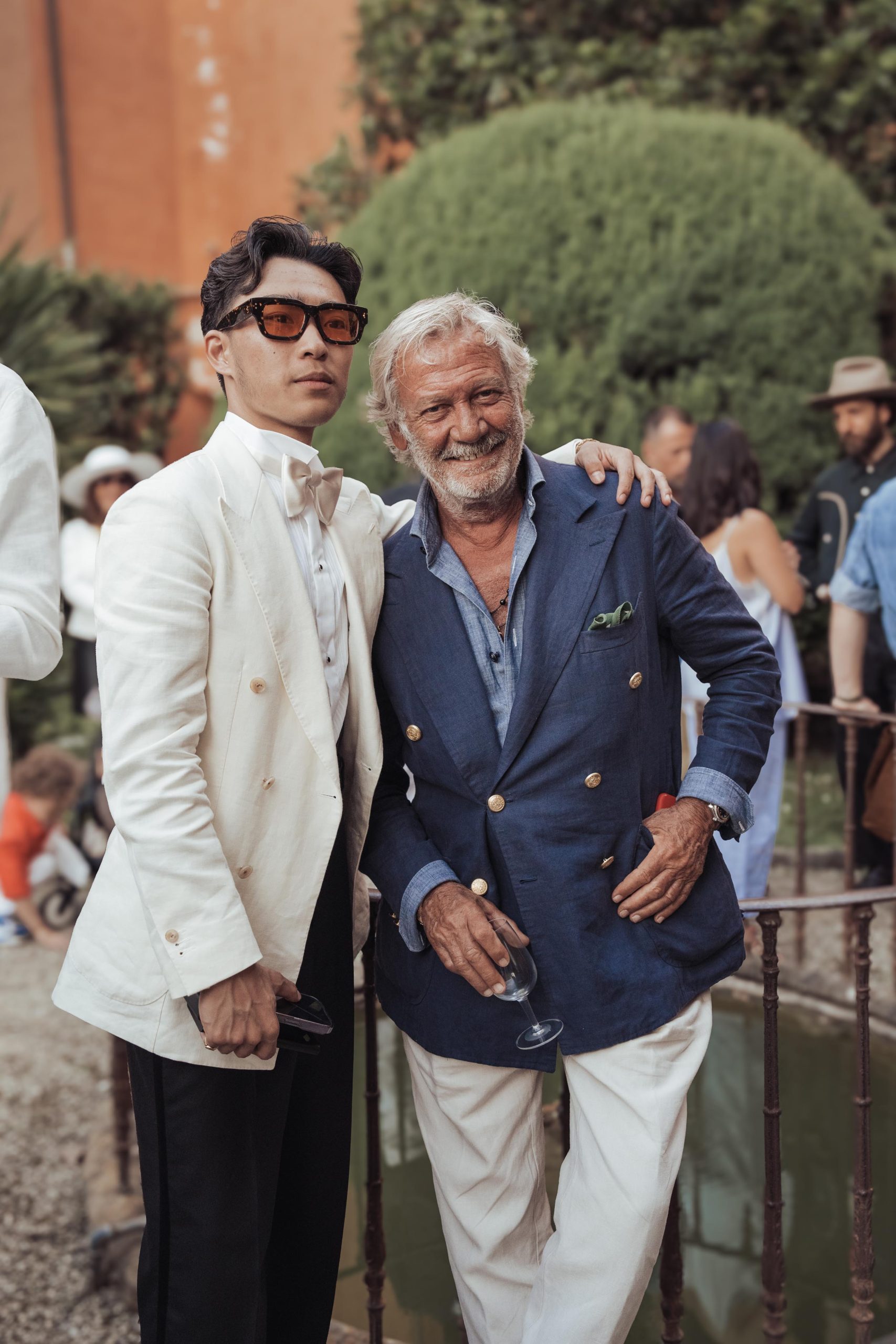 stylish gentlemen at the plaza uomo party during pitti uomo 106