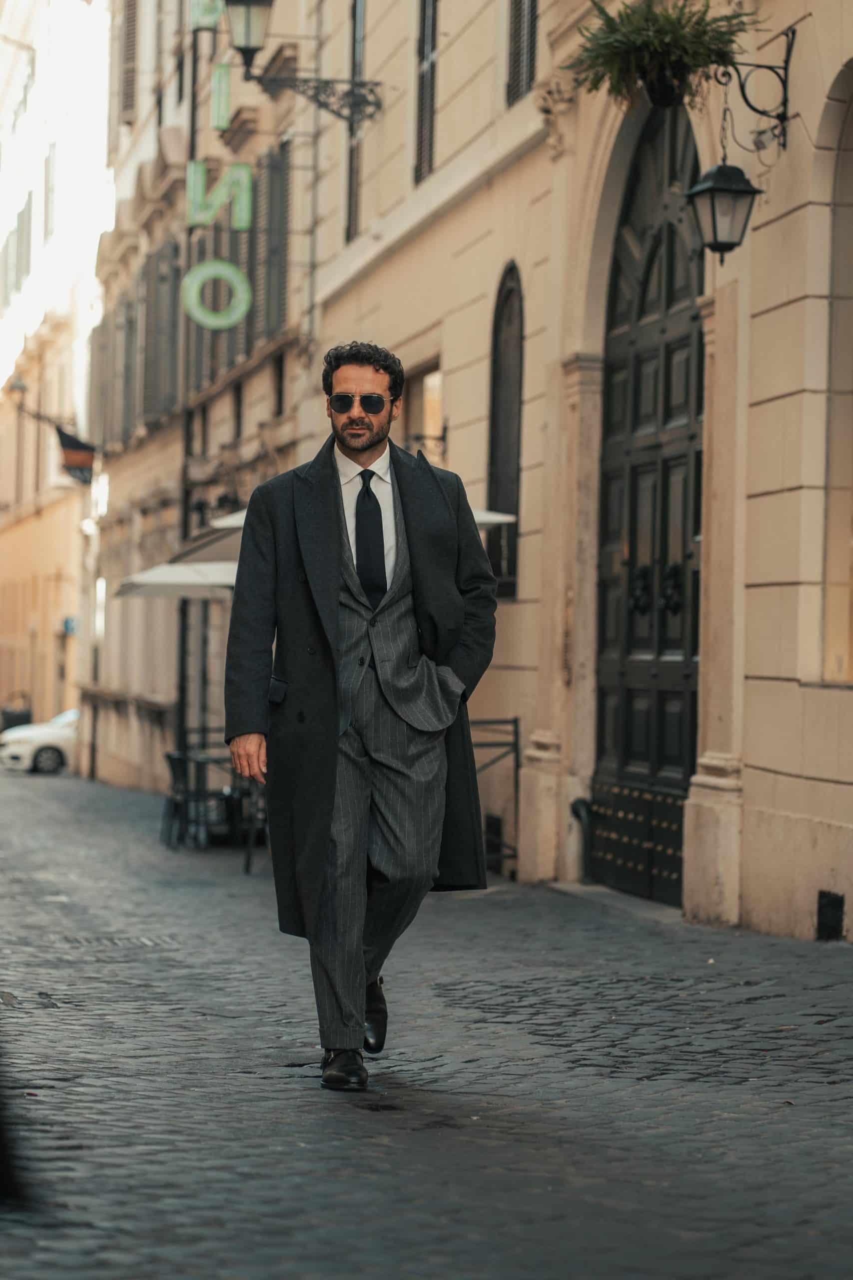 Giorgio giangiulio in a custom made chalkstripe grey suit by mond
