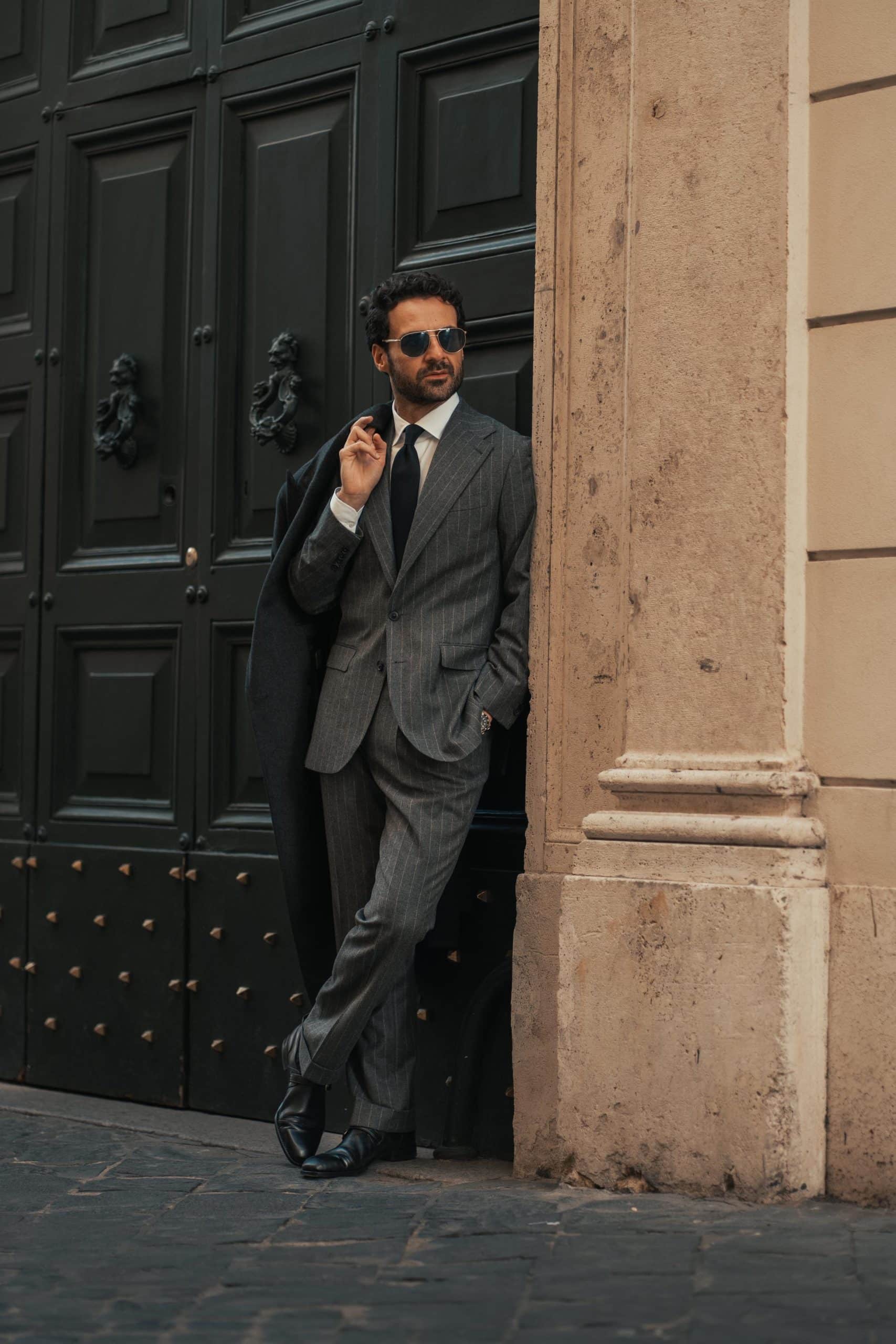 Giorgio giangiulio in a custom made chalkstripe grey suit by mond