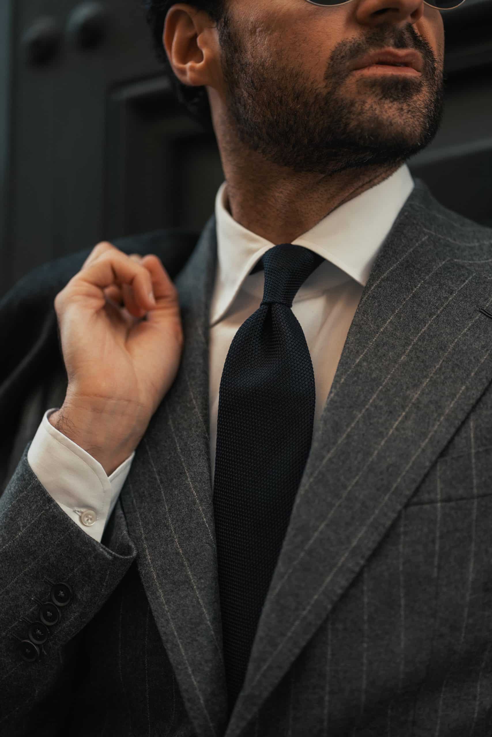 Giorgio giangiulio wearing a mond custom made chalkstripe grey suit