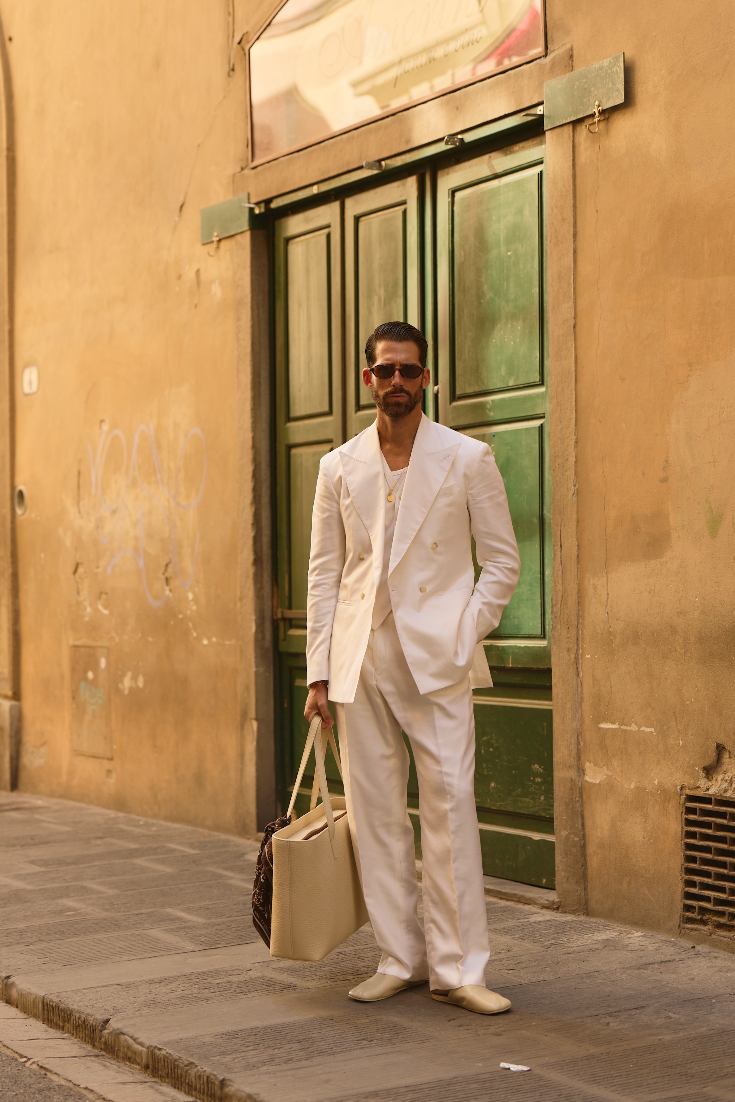 Carlos domord at pitti uomo, wearing a white silk, wool and linen suit