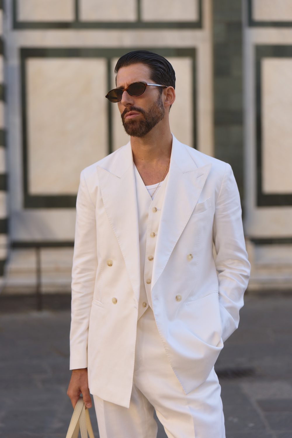 Carlos domord at pitti uomo, wearing off-white silk, wool and linen three piece suit