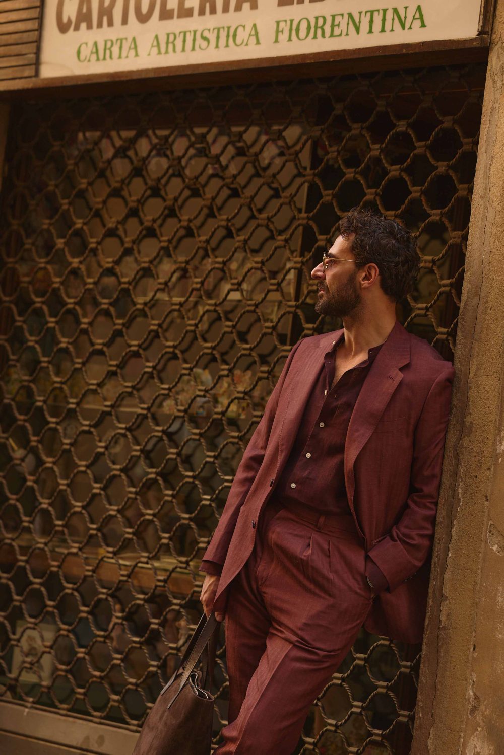 Giorgio giangiulio at pitti uomo 110 wearing a burgundy herringbone suit custom made by mond 16