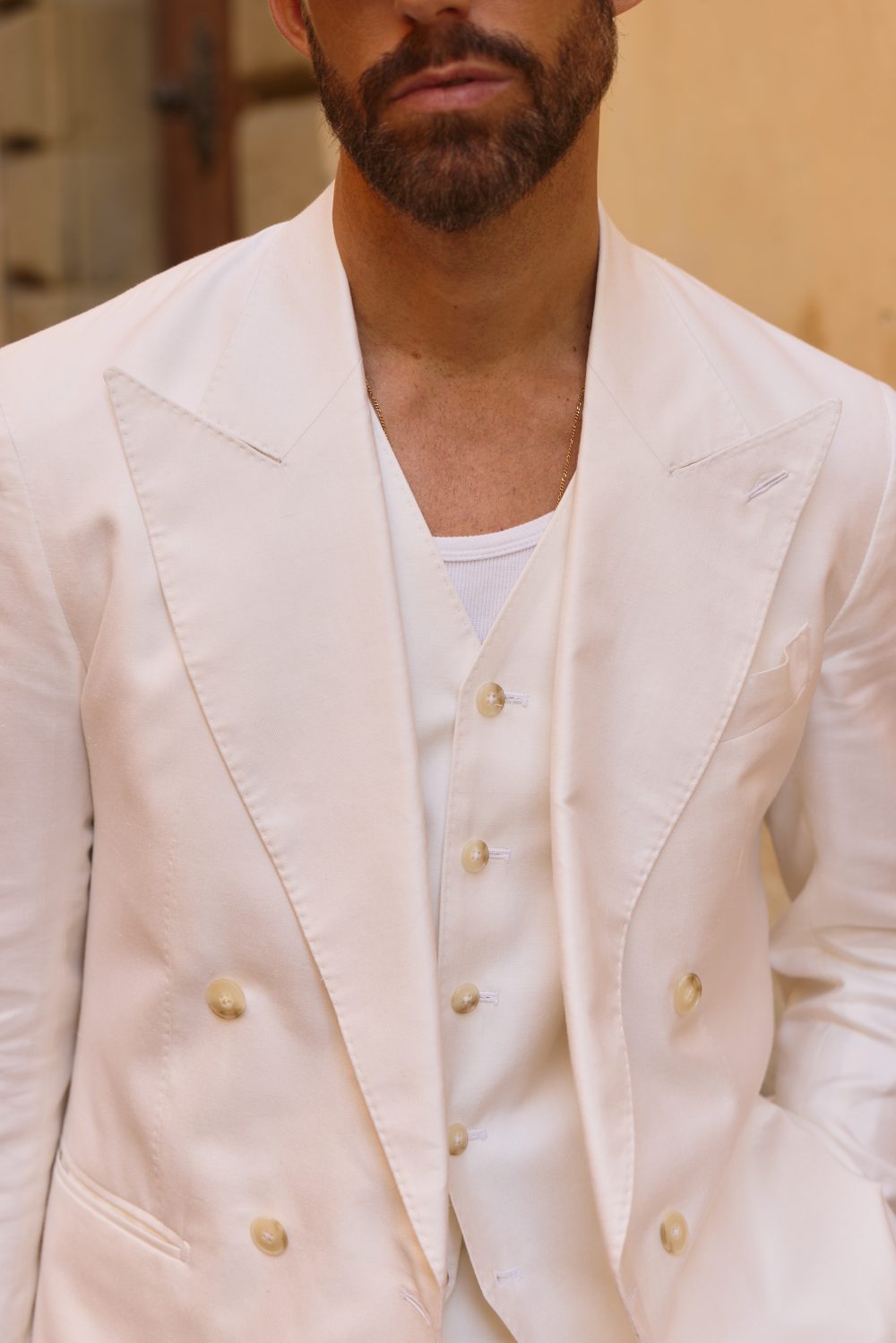Custom made white suit in silk, wool and linen blend worn by carlos domord at pitti uomo made by mond