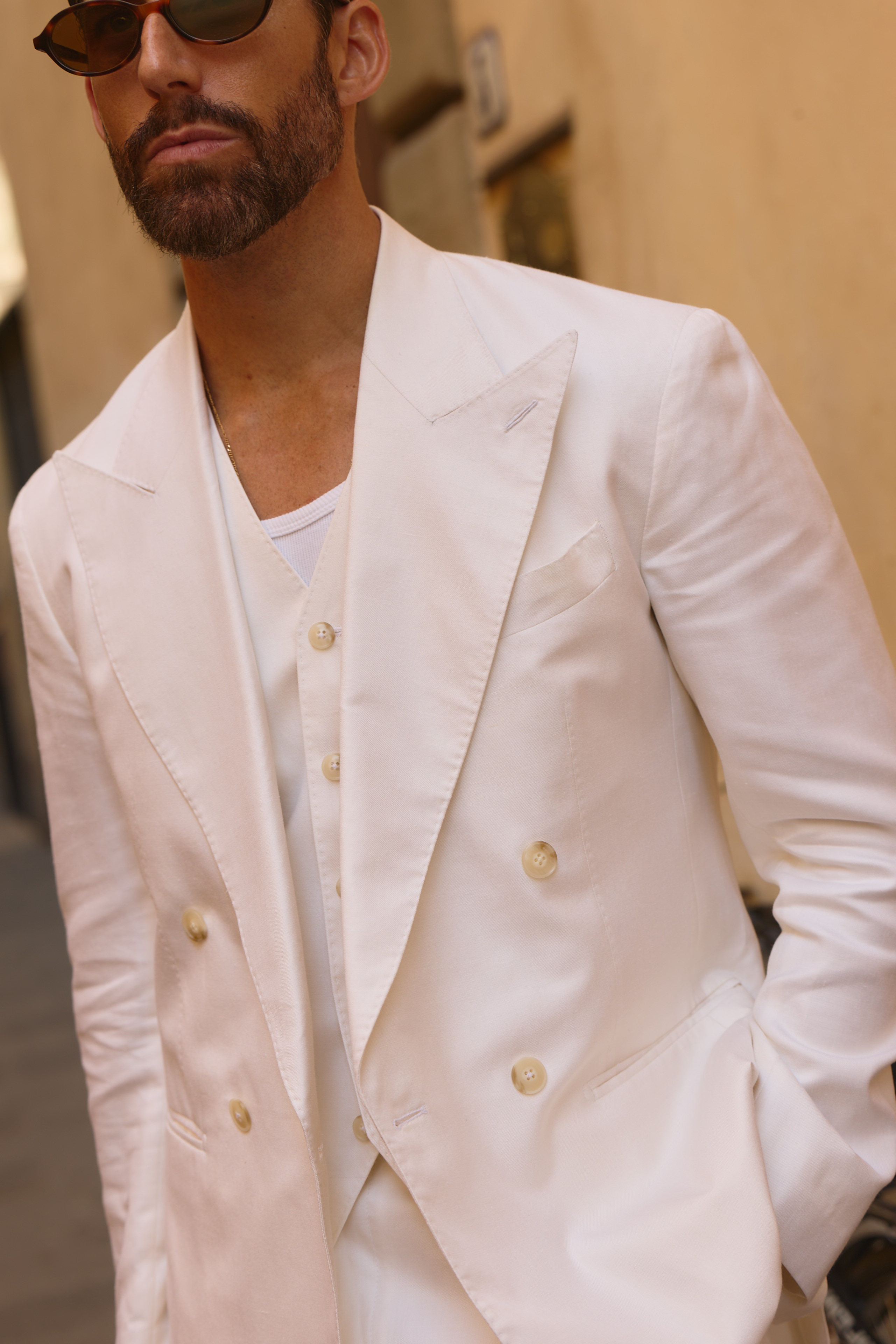 Custom made white suit in silk, wool and linen blend worn by carlos domord at pitti uomo