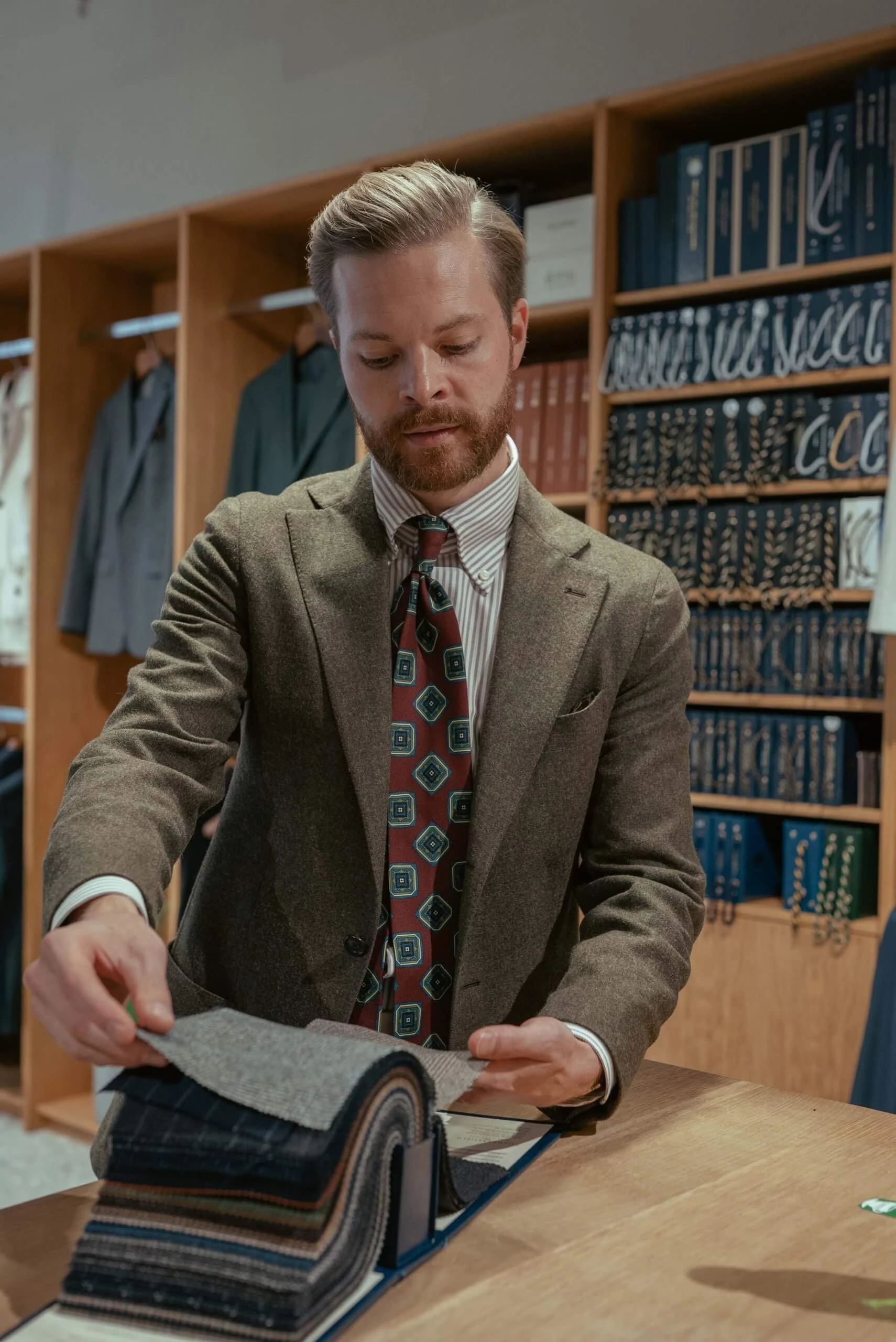 sartorial finn choosing a fabric for a suit
