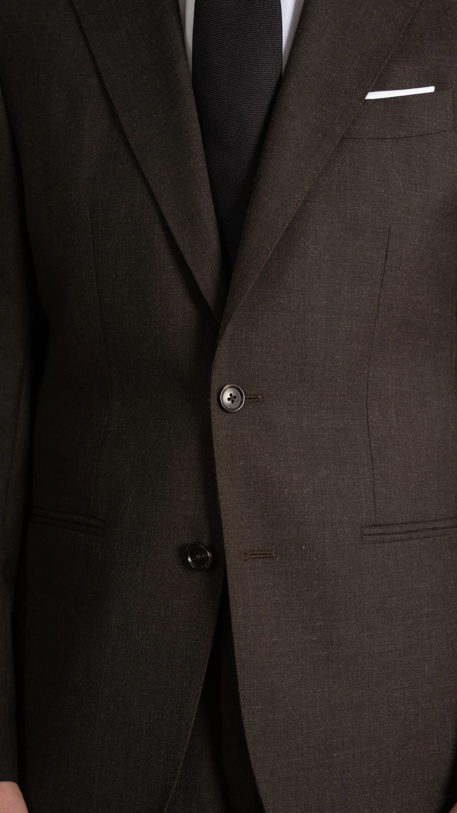 brown suit in twistair fabric, by Mond