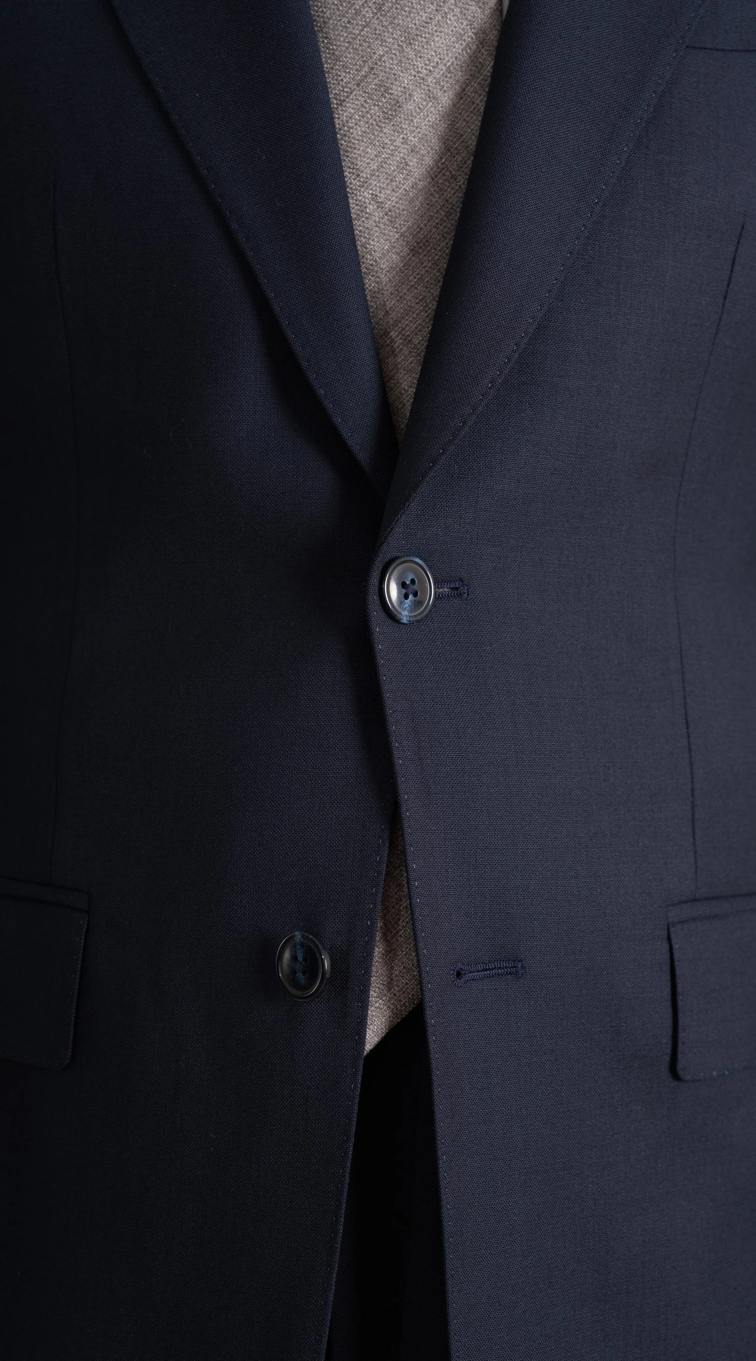 closeup of navy suit in twistair fabric