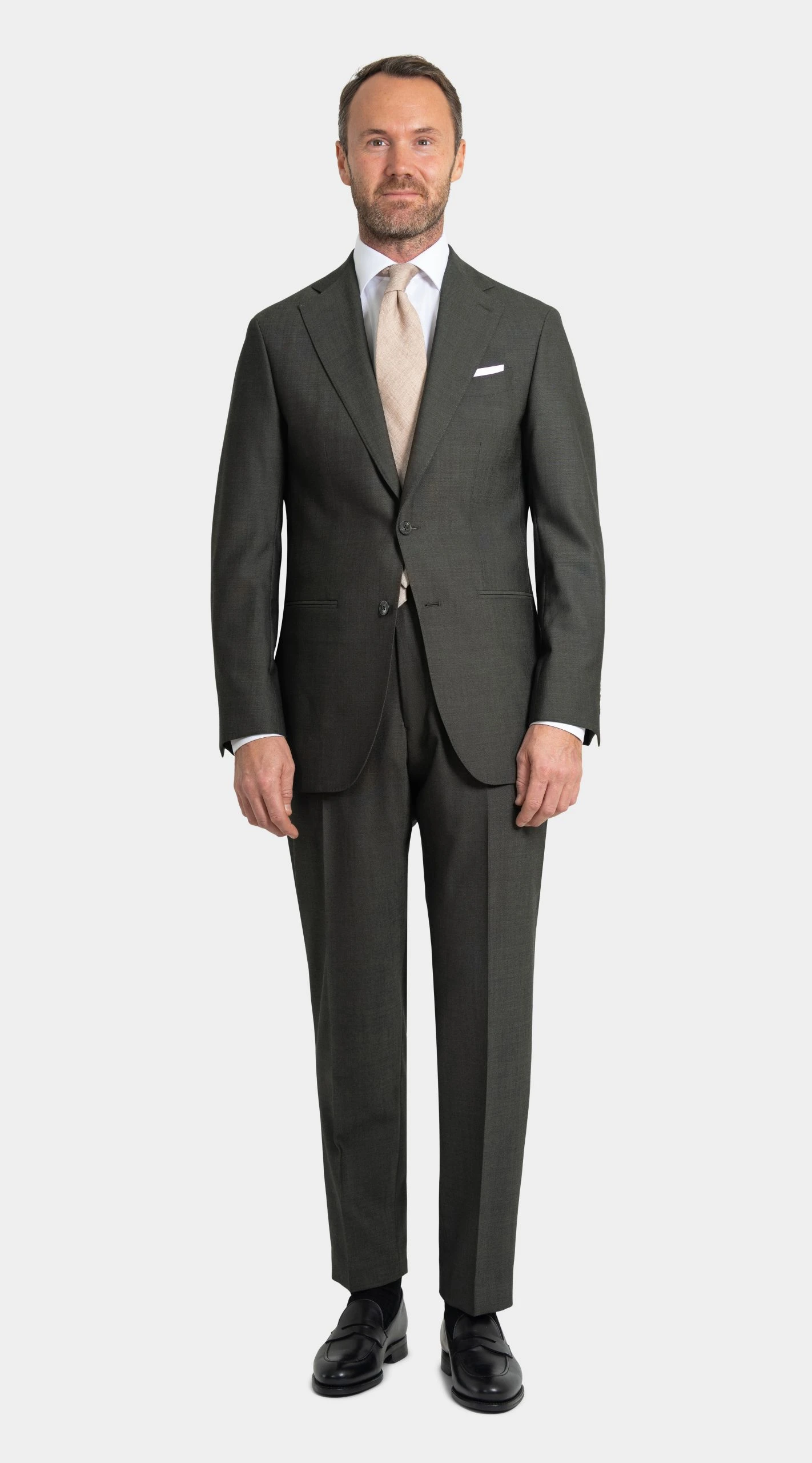 NEW forest green suit in twistair, with beige necktie and black patent shoes