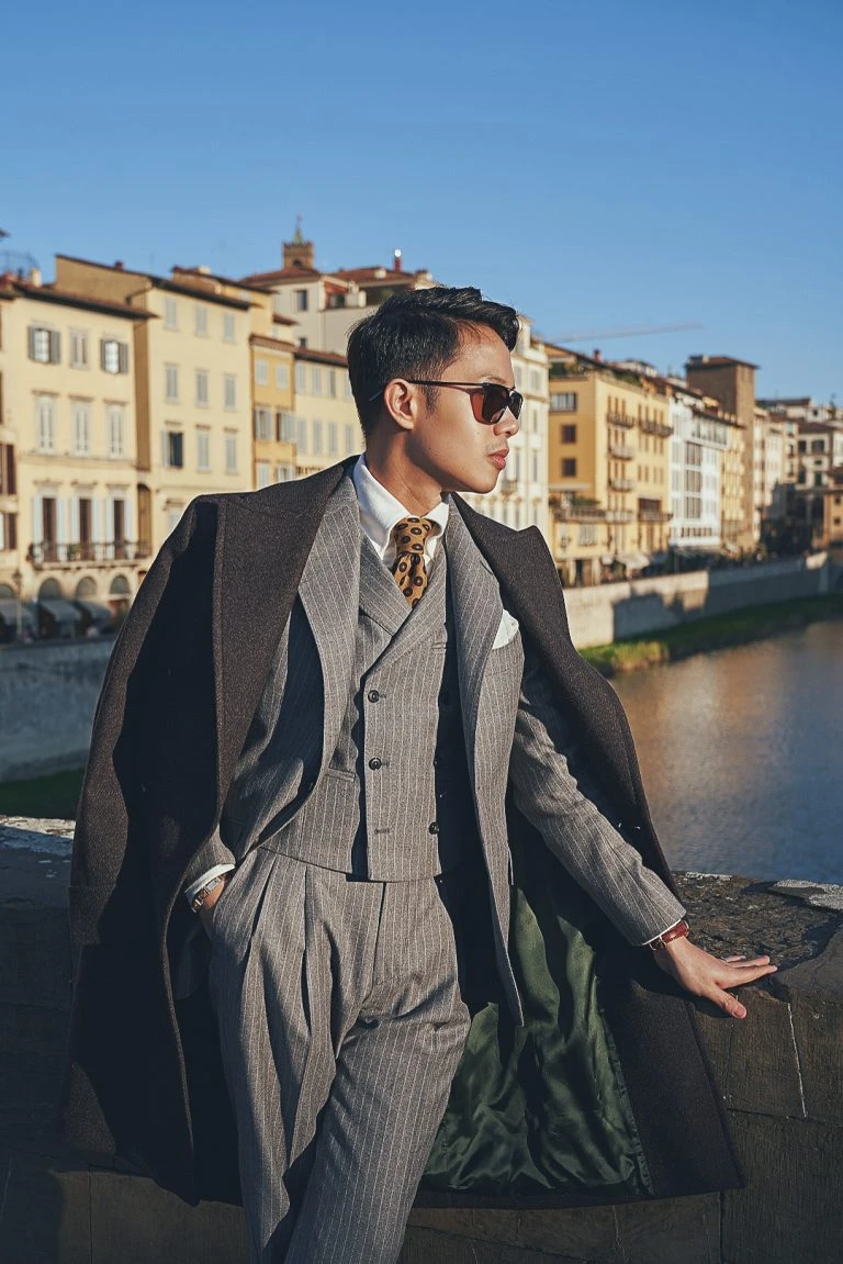 dresden ramos at pitti uomo 105, wearing a three piece striped flannel suit made by mond of copenhagen