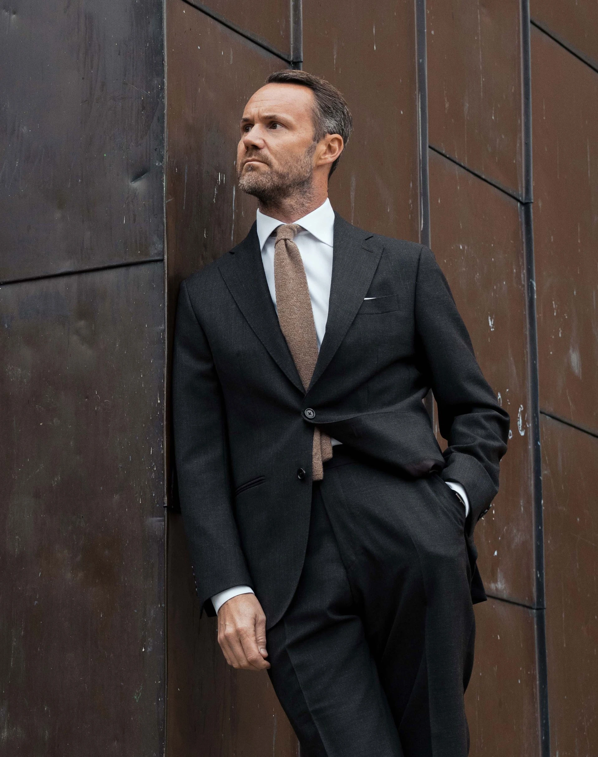 man in charcoal grey suit in twistair fabric