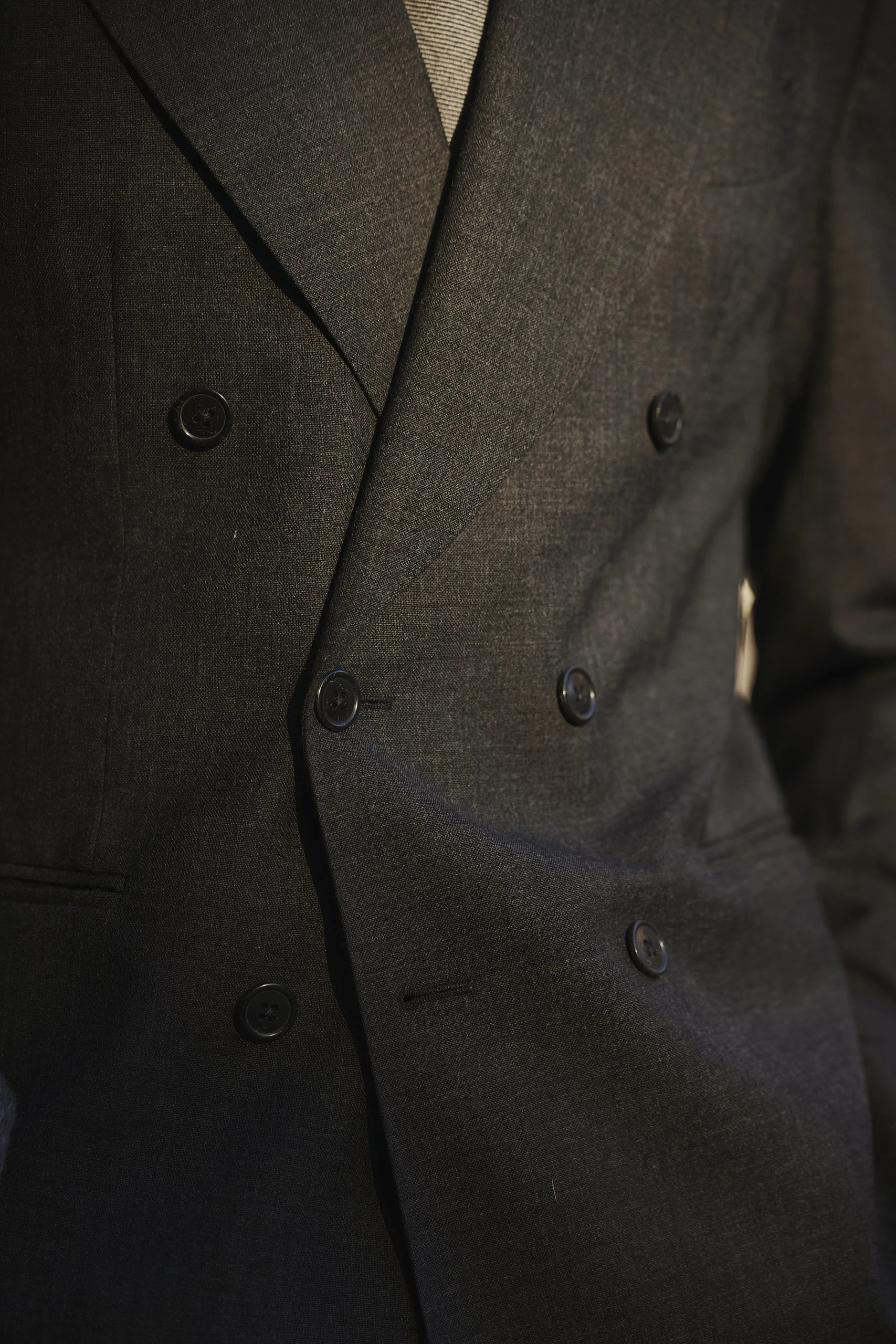Carlos Domord in a dark grey Twistair suit by mond of copenhagen