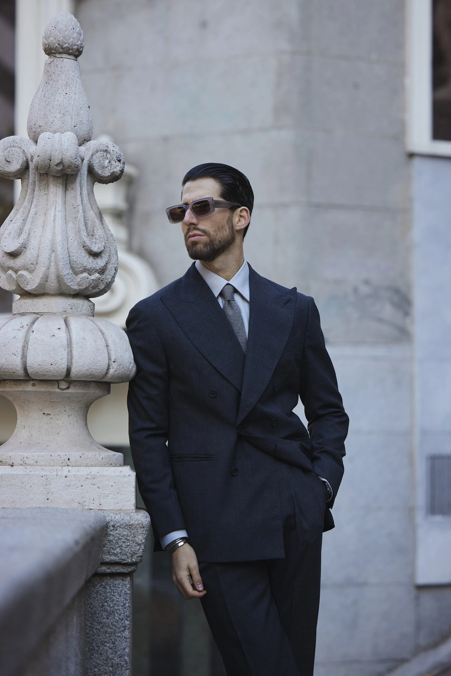 Carlos Domord wearing a classic charcoal grey Twistair suit by mond of copenhagen