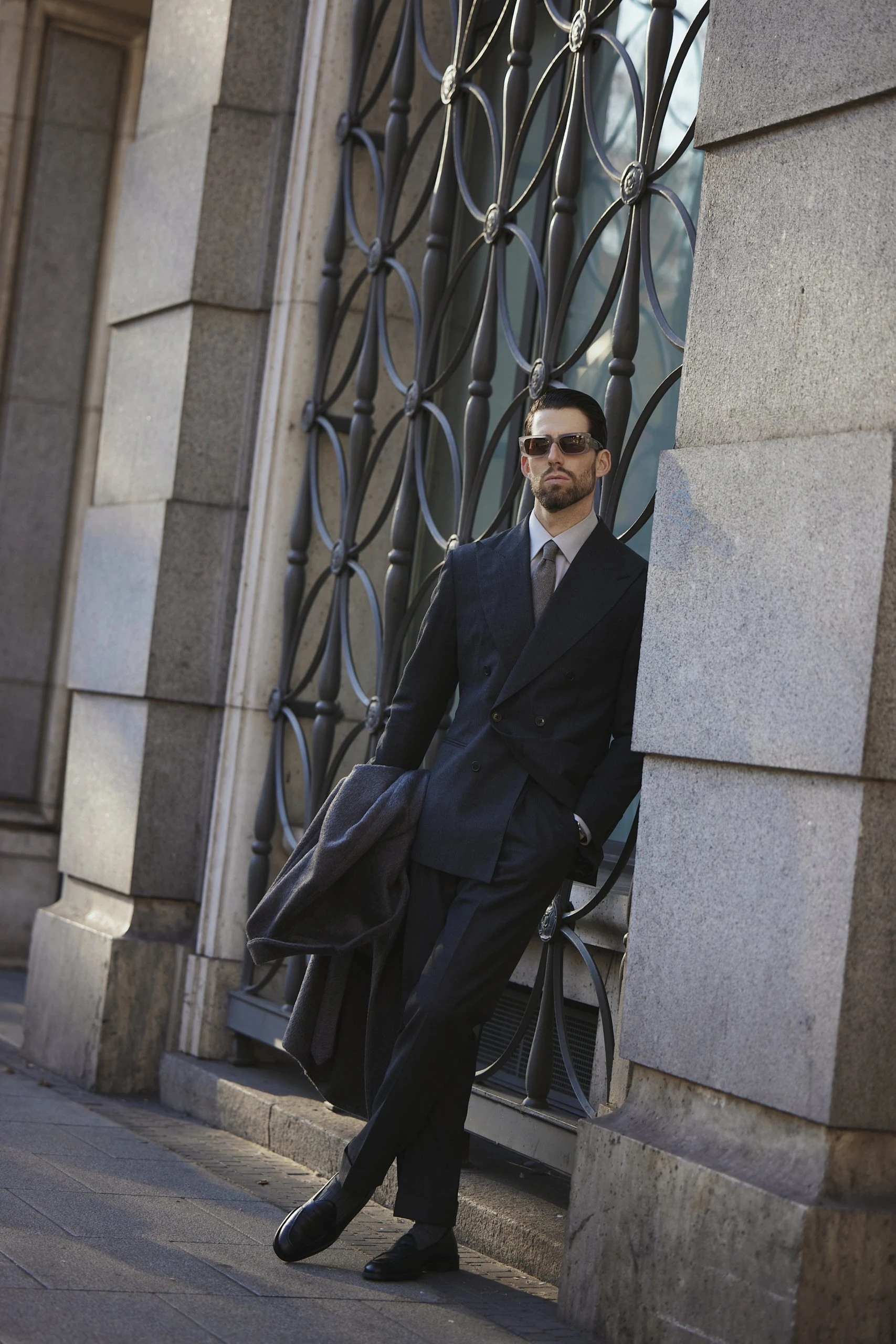 Carlos Domord wearing a classic dark grey Twistair suit by mond of copenhagen