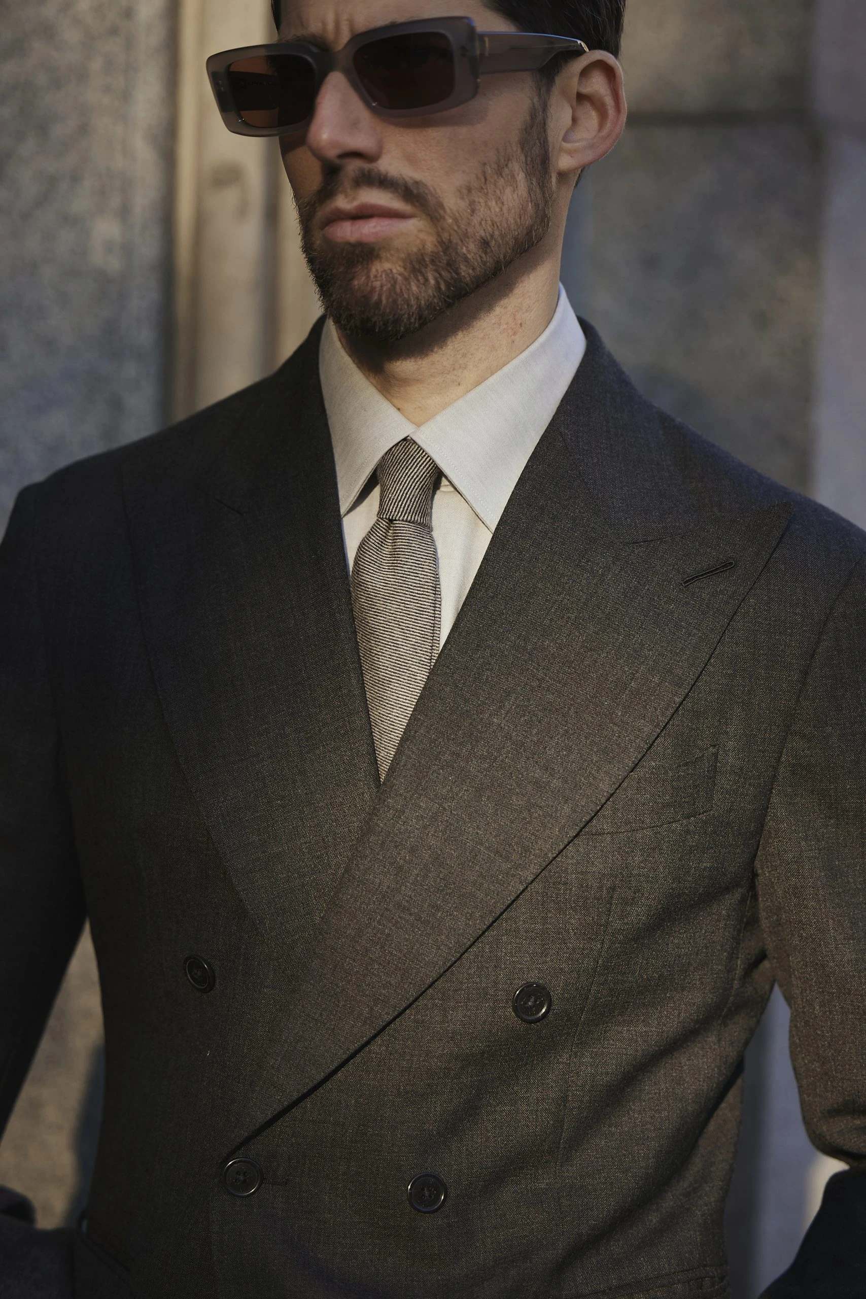 Carlos Domord wearing a dark grey Twistair suit by mond of copenhagen