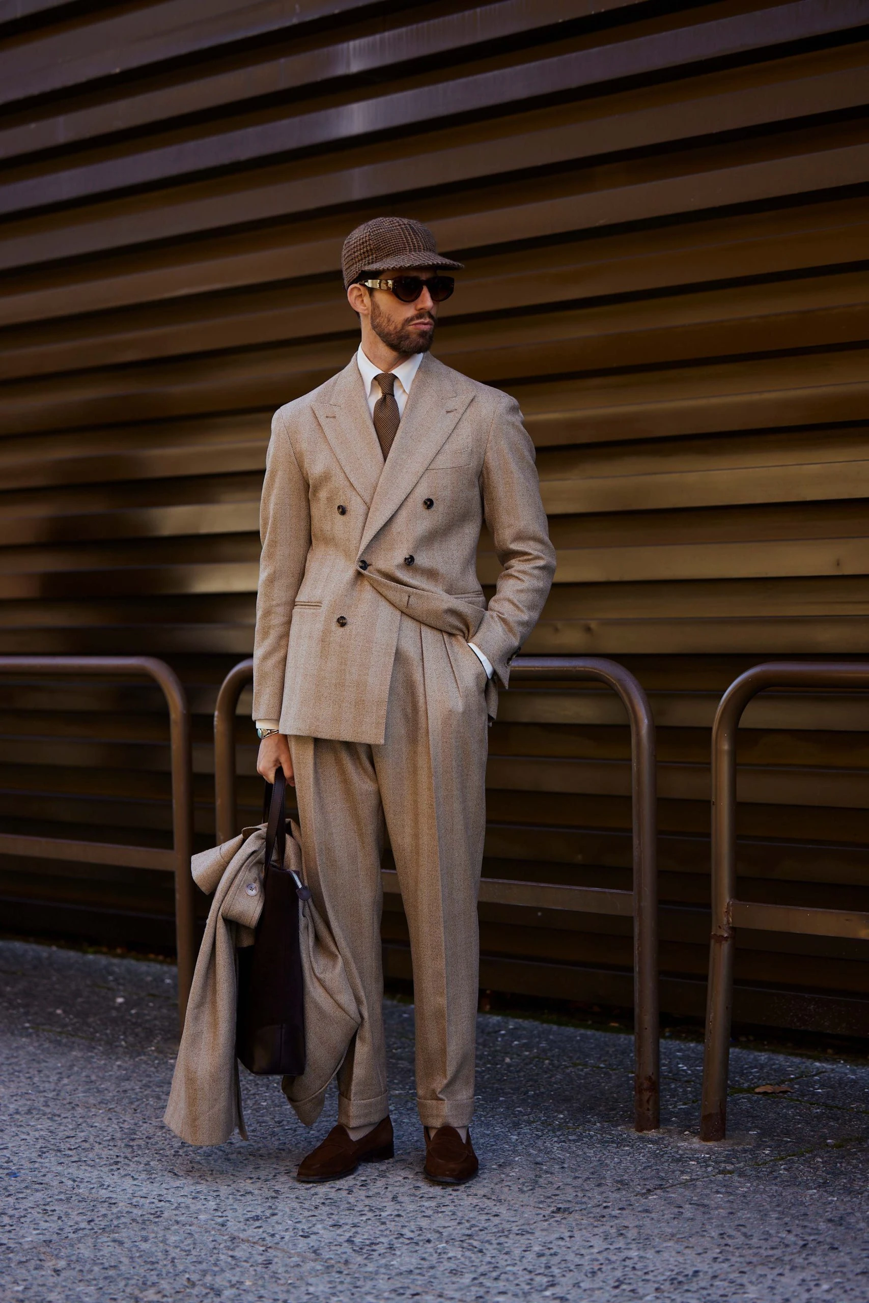 carlos domord at pitti uomo wearing a beige custom made mond suit