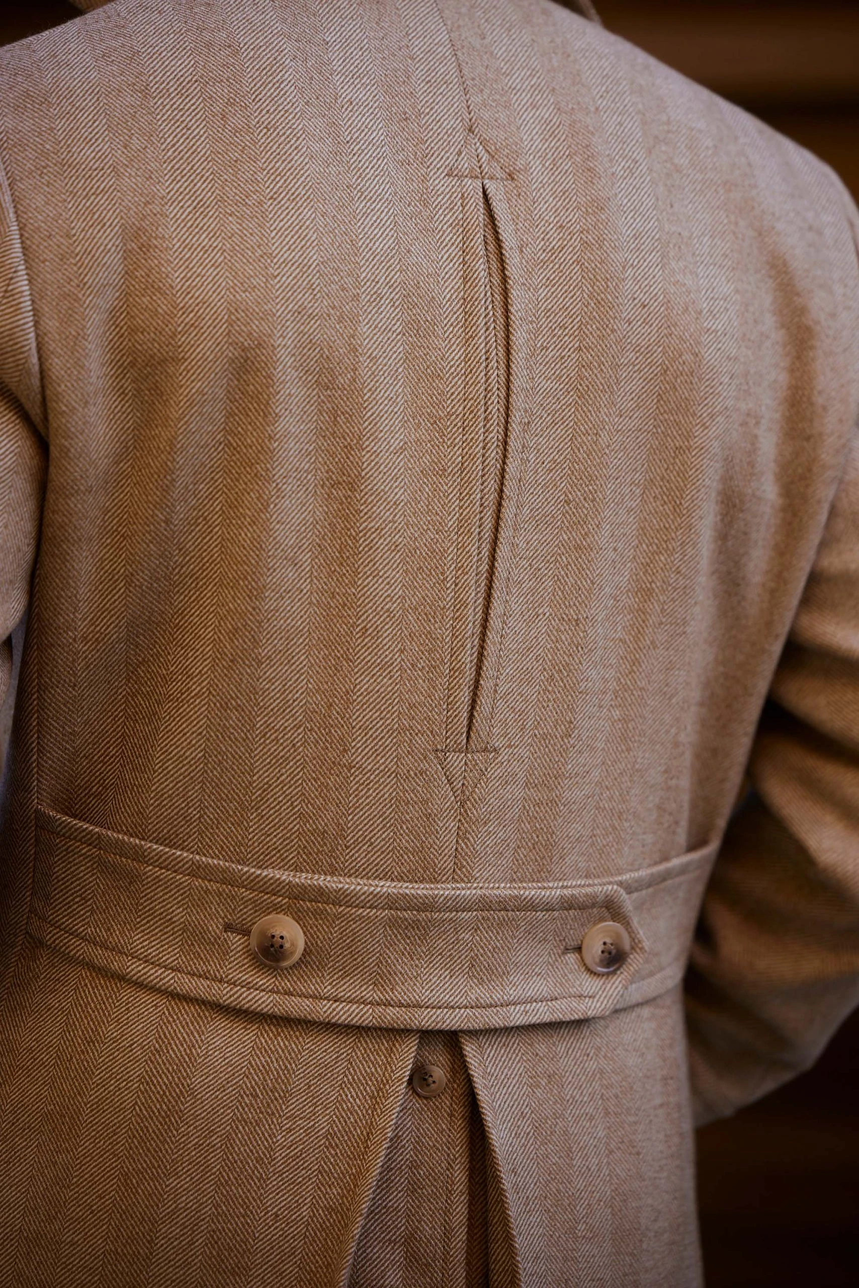 carlos domord at pitti uomo wearing a beige mond overcoat