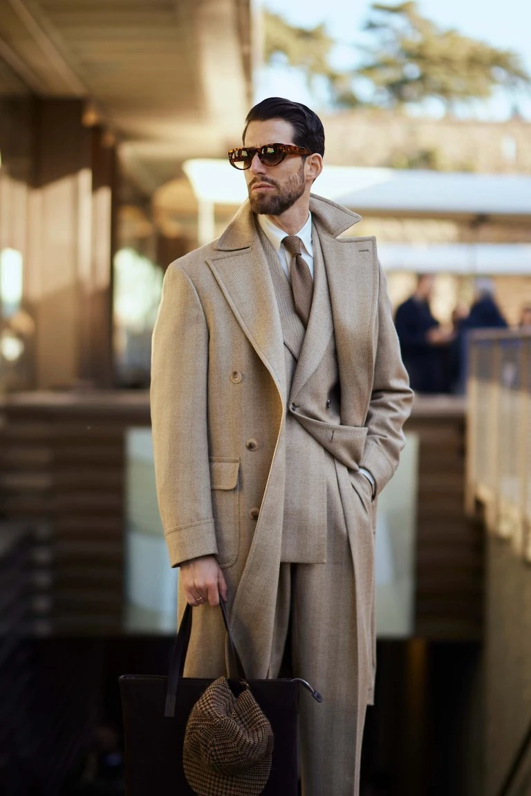 pitti uomo style, matching beige overcoat and suit as worn by carlos domord and made by mond
